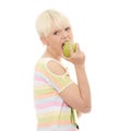 Beautiful young woman eating apple Royalty Free Stock Photo