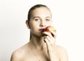 Beautiful young woman eating an apple. healthy food - strong teeth concept Royalty Free Stock Photo