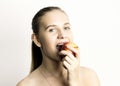 Beautiful young woman eating an apple. healthy food - strong teeth concept Royalty Free Stock Photo