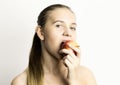 Beautiful young woman eating an apple. healthy food - strong teeth concept Royalty Free Stock Photo