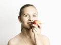 Beautiful young woman eating an apple. healthy food - strong teeth concept Royalty Free Stock Photo