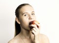 Beautiful young woman eating an apple. healthy food - strong teeth concept Royalty Free Stock Photo