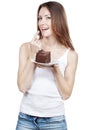 Beautiful young woman eating chocolate cake Royalty Free Stock Photo