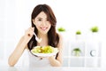 Beautiful young woman eating healthy food Royalty Free Stock Photo