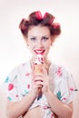 Beautiful young woman eating ice cream cone looking in camera isolated on white copy space background portrait image Royalty Free Stock Photo