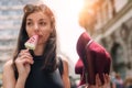 Beautiful young woman eating ice cream in the summer Royalty Free Stock Photo