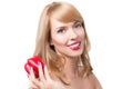 Beautiful young woman eating paprika Royalty Free Stock Photo