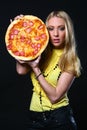 Beautiful young woman eating pizza Royalty Free Stock Photo