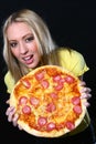 Beautiful young woman eating pizza Royalty Free Stock Photo