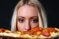 Beautiful young woman eating pizza Royalty Free Stock Photo