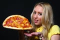 Beautiful young woman eating pizza Royalty Free Stock Photo