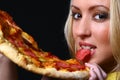 Beautiful young woman eating pizza Royalty Free Stock Photo