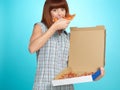 Beautiful young woman eating a pizza pie Royalty Free Stock Photo