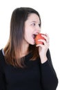 Beautiful young woman eating red apple Isolated on white background Royalty Free Stock Photo