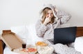 Beautiful young woman eating unhealthy food Royalty Free Stock Photo