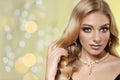 Beautiful young woman with elegant jewelry. Space for text Royalty Free Stock Photo