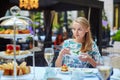 Beautiful young woman enjoying afternoon tea Royalty Free Stock Photo