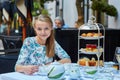 Beautiful young woman enjoying afternoon tea Royalty Free Stock Photo