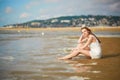 Beautiful young woman enjoying her vacation by ocean or sea Royalty Free Stock Photo