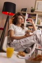 Woman eating strawberries Royalty Free Stock Photo