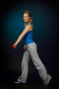 Beautiful young woman exercising in the gym Royalty Free Stock Photo