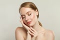 Beautiful young woman face. Healthy spa model with clear skin. Skincare and facial treatment concept Royalty Free Stock Photo