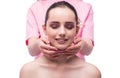 The beautiful young woman during face massage session Royalty Free Stock Photo