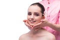 The beautiful young woman during face massage session Royalty Free Stock Photo