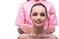 The beautiful young woman during face massage session Royalty Free Stock Photo