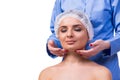 The beautiful young woman during face massage session Royalty Free Stock Photo