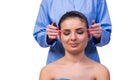 The beautiful young woman during face massage session Royalty Free Stock Photo