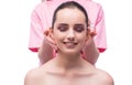 The beautiful young woman during face massage session Royalty Free Stock Photo