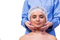 The beautiful young woman during face massage session Royalty Free Stock Photo