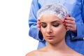 The beautiful young woman during face massage session Royalty Free Stock Photo