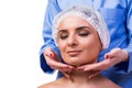 The beautiful young woman during face massage session Royalty Free Stock Photo