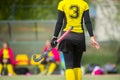 A beautiful young woman field hockey player Royalty Free Stock Photo