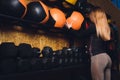 Beautiful young woman in fitness center doing pilates exercise with fitness ball. Healthy lifestyle concept. Royalty Free Stock Photo