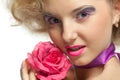 Beautiful young woman with a flower. Royalty Free Stock Photo