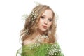 Beautiful young woman flowers on blonde curly hair isolated on white Royalty Free Stock Photo