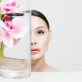 Beautiful young Woman and Flowers in the Bottle Royalty Free Stock Photo