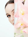 Beautiful young Woman and Flowers in the Bottle Royalty Free Stock Photo