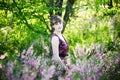 Beautiful young woman with flowers