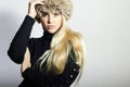 Beautiful Young Woman in Fur Hat. Pretty Blond Girl. Winter Fashion Beauty Royalty Free Stock Photo