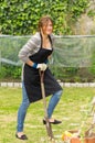 Beautiful young woman gardening Royalty Free Stock Photo
