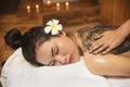 Beautiful young woman getting spa massage salon Royalty Free Stock Photo