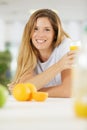 beautiful young woman with glass orange juice