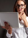 Beautiful young woman in glasses. Student girl with laptop. Business lady Royalty Free Stock Photo