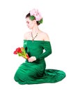 Beautiful young woman in a green evening dress Royalty Free Stock Photo