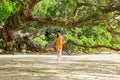 Beautiful young woman at Hahei Beach, New Zealand