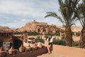 Beautiful young woman happy to travel in Morocco. Ait-Ben-Haddou on background Royalty Free Stock Photo